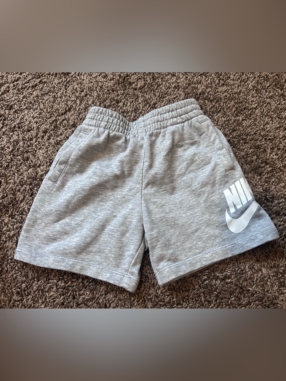 Nike Light Gray Athletic Shorts with White Swoosh